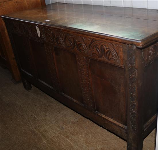 Carved oak  pannelled coffer